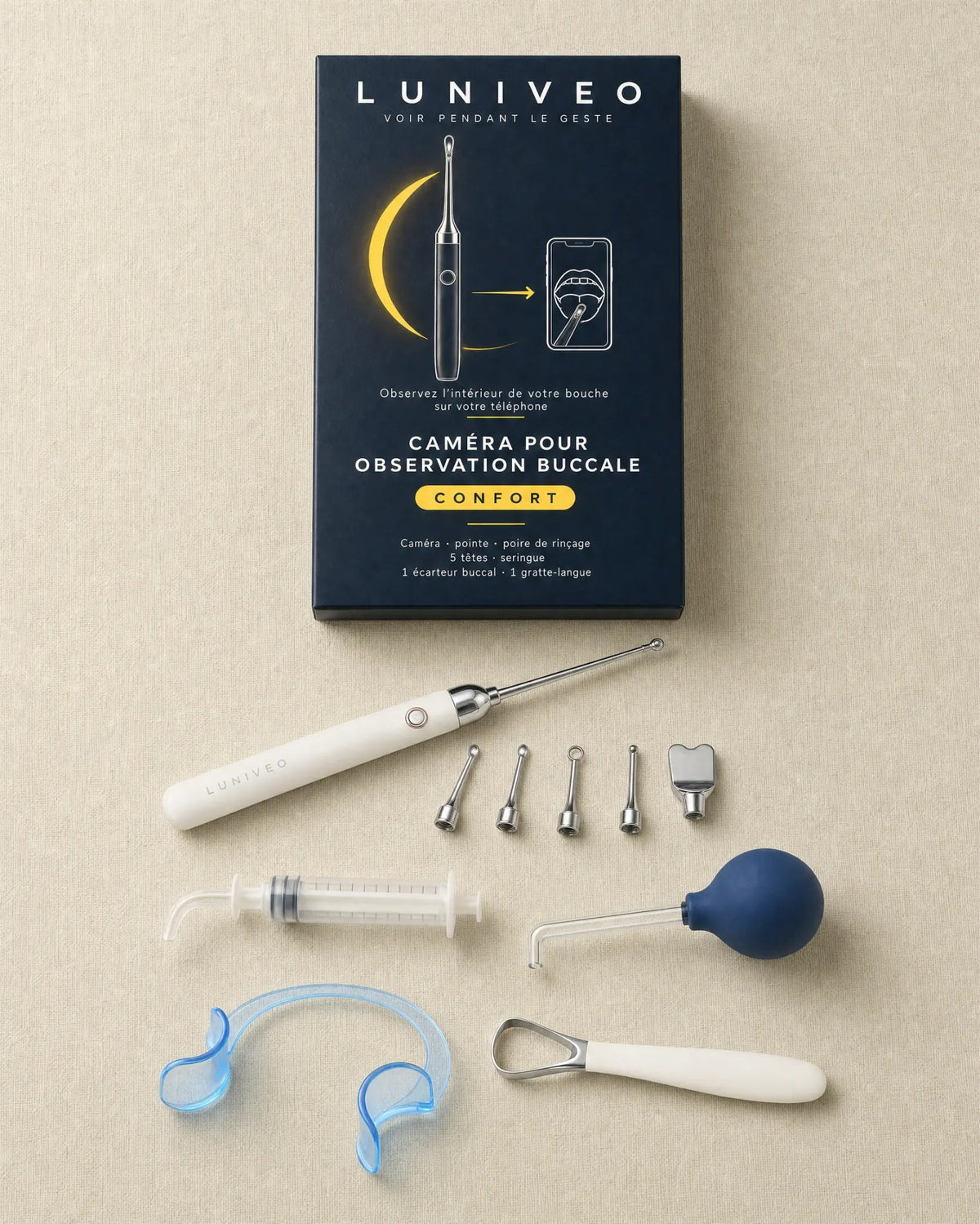 Le kit Confort : l'Essentiel, cinq têtes et une seringue, avec l'écarteur et le gratte-langue offerts